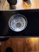 Top view of clear pressed glass bowl showing interior pattern