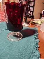 Goblet upright showing ruby bowl and clear foot