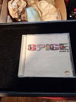 Front of Spice Girls "Spice" CD jewel case showing title artwork