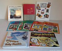 All nine books arranged, front covers visible