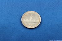 Reverse of 1939 Canadian silver dollar showing Parliament Buildings