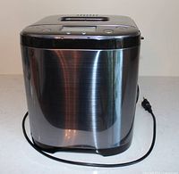 Full view of bread maker exterior with cord