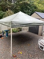 Full view of assembled canopy tent outdoors