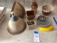 assortment of ceramic planters, jug, lattice holder, dish, stone fruit and banana