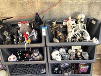 Bins containing full assortment of Halloween decorations