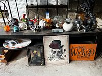 Shelf view showing majority of Halloween and fall decor items