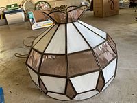 Full view of stained glass lamp shade showing colors and facets