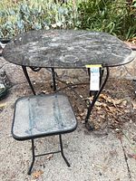 Both tables together outdoors showing relative sizes