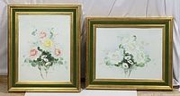 Both framed floral paintings front view