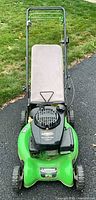 Front view of green Lawn-Boy mower with beige bag attached