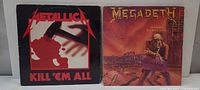 Metallica Kill ’Em All and Megadeth Peace Sells LP front covers