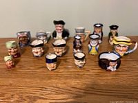 Group shot of all character mugs on table