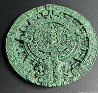 Front view showing Aztec calendar design and green crushed malachite surface