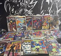 Overview of all twelve bagged Superman comics laid out in two rows