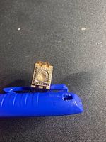 Ring front showing rectangular bezel and stones