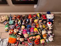Full lot overview displaying quantity and variety of plush toys