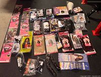 overview of all packaged wigs, braiding hair, foam head and accessories laid out on floor