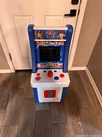 Full front view of Paw Patrol mini arcade showing controls and screen