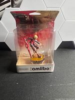 Front view of sealed Shulk amiibo in blister pack