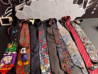 All nine neckties laid out side by side