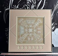 Full view of framed sandpainting showing artwork, mat and frame