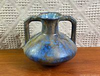 Front view showing overall shape, glaze pattern and handles