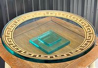 Top angled view showing full bowl, gold Greek key border and pedestal