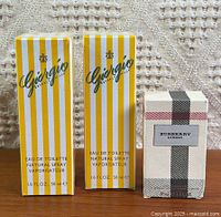 Front view of all three sealed fragrance boxes