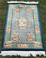 Full view of rectangular Pagoda Arabel wool rug on grass