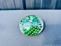 top view showing green swirl and bubbles