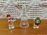 Front view of three Swarovski crystal pieces