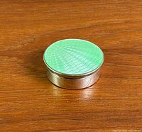 Top view showing green guilloché enamel lid