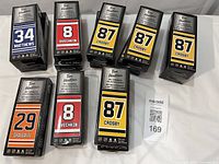 All 14 boxed Tim Hortons mini sticks arranged on table displaying player numbers and names