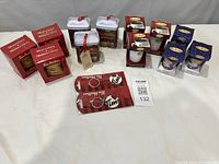 Group shot showing all keychains and boxed ornaments