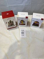 Three Hallmark Keepsake Peanuts ornaments boxed
