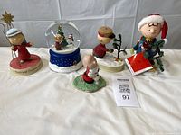 Group shot of all five Peanuts items