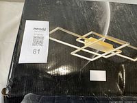 Box top showing image of LED flush light fixture