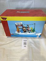 Front of sealed box showing product image and Peanuts branding