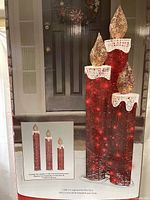 Front of box showing three red LED candles