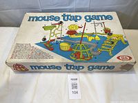 Box lid showing Mouse Trap Game graphics and Ideal logo