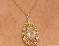 Pendant on model showing scale and chain