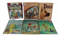Six Little Golden Books including Sesame Street The Together Book, Buffalo Bill Jr., Dogs, Big Bird title, Woody Woodpecker and Bambi