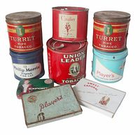 Group shot of all nine tins