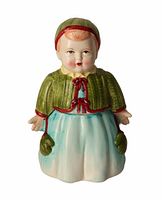 Front view of ceramic girl cookie jar showing overall design and colors