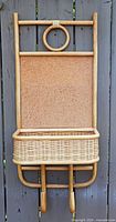 Full front view showing corkboard, basket, hooks, and ring top