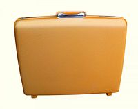 Front view of yellow Samsonite suitcase showing textured vinyl exterior and feet