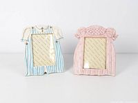 Front view of both baby clothes shaped photo frames