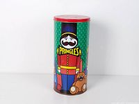 Front view of tall Pringles nutcracker tin