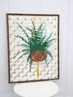 Full view of rectangular painted mirror on stand