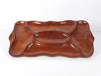 Top view showing five recessed sections and wavy edges